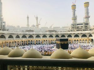 crowd on courtyard with kabah